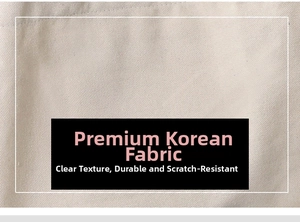 Close-up of premium wear-resistant beige canvas fabric showing clear woven texture