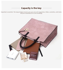 Top view of large capacity tote bag interior showing iPad, phone, and makeup storage