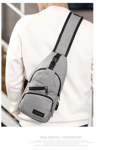 Detailed back view of a grey nylon crossbody chest bag with adjustable buckle strap