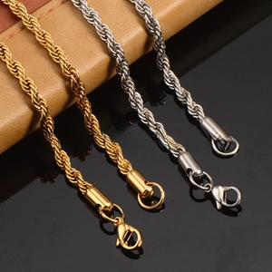 Detail of gold and silver stainless steel rope chains with secure lobster clasps