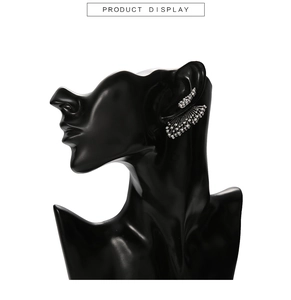 Detail shot of silver wing-shaped ear cuff with multi-drill alloy rhinestones display