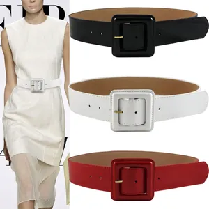 Versatile patent leather wide waist belt with large square buckle in black white and red