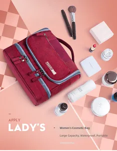 Waterproof travel toiletry bag with multiple compartments and a burgundy textured finish