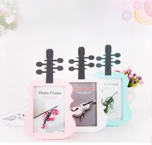 Creative violin-shaped photo frames in pink, white, and blue colors, size 135x173mm