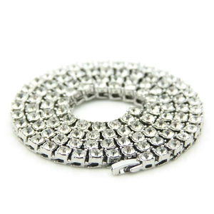Close-up of 5mm silver hip hop tennis chain with clear cubic zirconia stones on white background