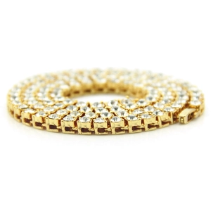 Detailed close-up of 5mm gold hip hop tennis chain with shimmering cubic zirconia