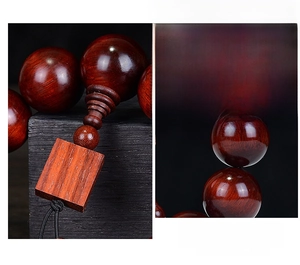Close-up of polished dark red sandalwood beads with detailed natural wood grain