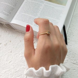 Minimalist S925 silver ring with rectangular stone and gold twisted rope band design