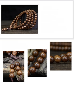 Macro detail of natural sandalwood beads showing fine wood grain and handcrafted finish