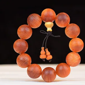 Translucent Blood Dragon wood beaded bracelet with twelve polished 20mm round beads