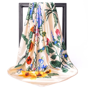 Detailed view of luxury morning glory floral print on a 90x90cm satin silk square scarf