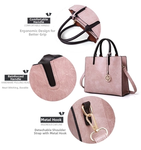 Pink PU leather handbag detail showing ergonomic handle, reinforced stitching, and gold hooks
