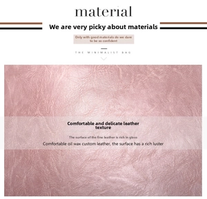 Detail of rose gold oil wax leather with rich litchi texture and glossy finish