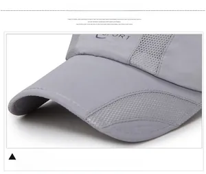 Close-up of gray mesh baseball cap showing breathable fabric and durable stitched brim
