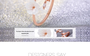 Detail of rose gold flower ring with white petals and shimmering zircon accents