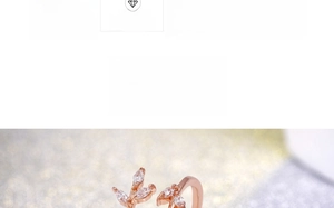 Detail of rose gold flower branch ring featuring marquise-cut marquise cubic zirconia