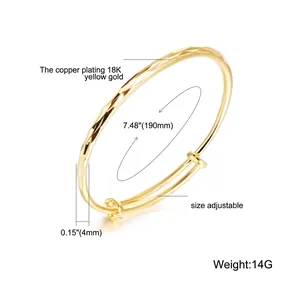 Elegant 18K gold-plated copper bangle with diamond-cut texture and adjustable closure