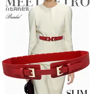 Elegant red wide elastic waist belt for women with dual golden metal buckles for coats
