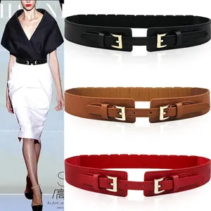 Women's wide elastic corset waist belt with gold E-buckle in black, brown and red