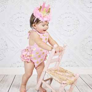 Pink toddler birthday outfit with gold polka dot bodysuit and floral crown headband