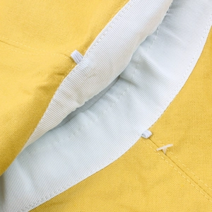 Breathable yellow cotton sun hat with wide brim showing inner lining and sweatband detail