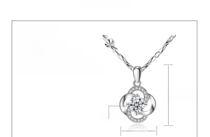 Detailed view of silver clover pendant with cubic zirconia inlay and 45cm chain