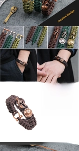 Detail view of woven paracord survival bracelet with Spartan helmet and shield charms