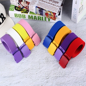 Colorful nylon canvas belts with matte paint buckles in various vibrant fashion shades