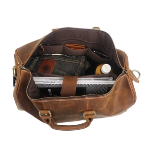 Brown crazy horse leather travel duffel bag with spacious interior and functional compartments