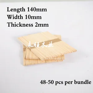 Detail showing 140x10x2mm natural wooden popsicle sticks bundled with paper tape for DIY