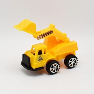 Detail view of yellow toy excavator with movable joints and realistic black tires