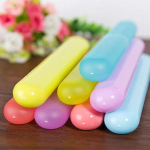 Portable multi-colored cylindrical toothbrush storage boxes for travel in matte plastic