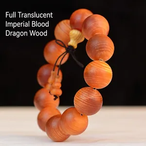 Translucent Dragon Blood Wood prayer beads with red grain and black tassel knot