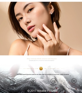 Detail of minimalist plum blossom open rings and stud earrings set with zircons