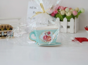 European style mint green tea cup and saucer set in gift bag with golden bow tie