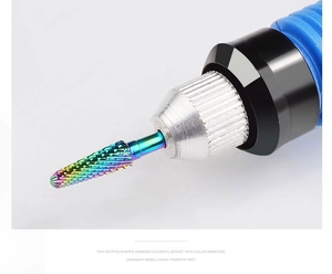 Macro detail of rainbow plated alloy nail drill bit with spiral texture for manicures
