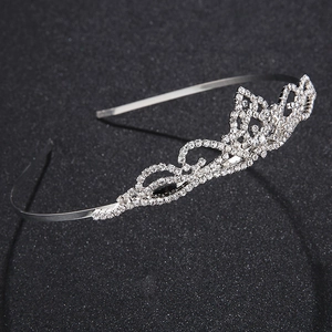 Elegant silver rhinestone crown tiara for wedding and birthday parties on black background