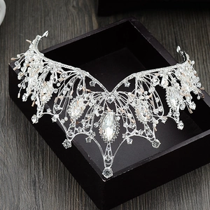 Detail of silver Baroque bridal crown with crystals and pearls in a black display box