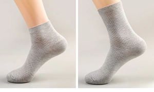 Comparison of light grey crew socks and ankle socks featuring waffle knit texture
