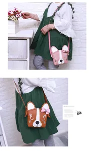 Detail of pink and brown puppy crossbody bags for kids with embroidery and cute bows