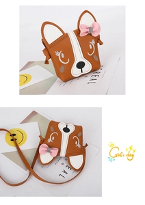 Detail of cute puppy-shaped crossbody bag with bow decoration and smooth brown PU leather