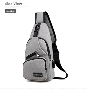 Light grey crossbody bag showing side view with USB port and durable nylon texture