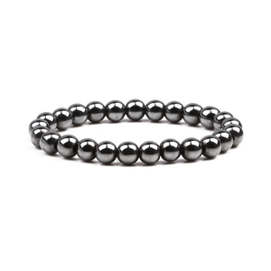 Minimalist 8mm polished magnetic hematite beaded bracelet for men on white background