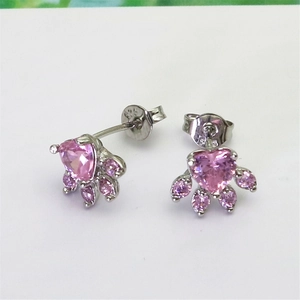 Detail view of S925 sterling silver stamp on pink heart-shaped cat paw stud earrings
