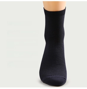 Detailed knit texture of breathable bamboo fiber socks on a foot model