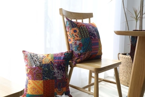 Close-up of bohemian style cotton linen cushion covers with colorful ethnic patterns