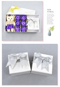 Detail of soap roses with a plush bear and premium cotton towel in a purple gift set