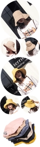 Detail view of foldable cotton linen sun hat with wide brim showing multiple color options