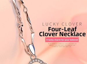 Macro shot of rotating 925 silver four-leaf clover necklace with sparkling white zircons