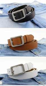 Detailed view of square matte metal buckles on black, brown, and white leather belts